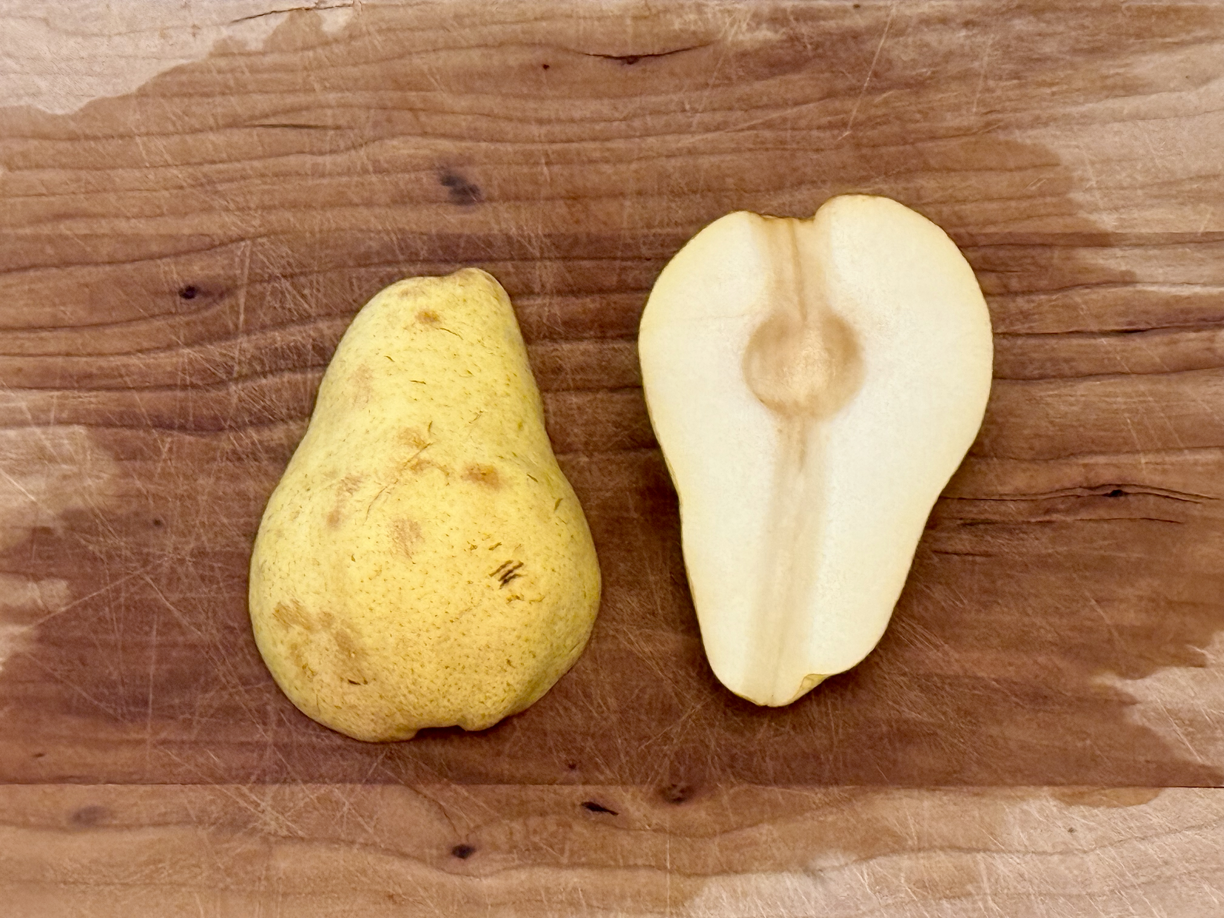 A pear cut in half.